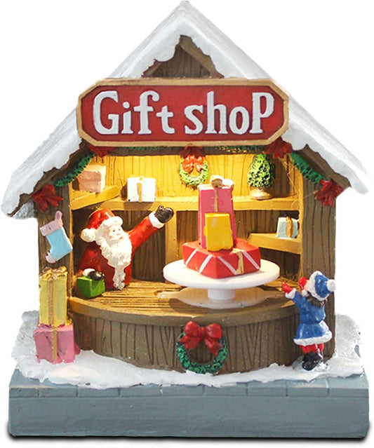 Christmas Village Gift Shop with Rotating Display & Lights isolated on a white background