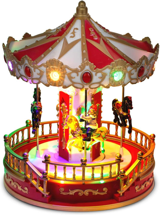 Christmas Village musical carousel isolated on a white background