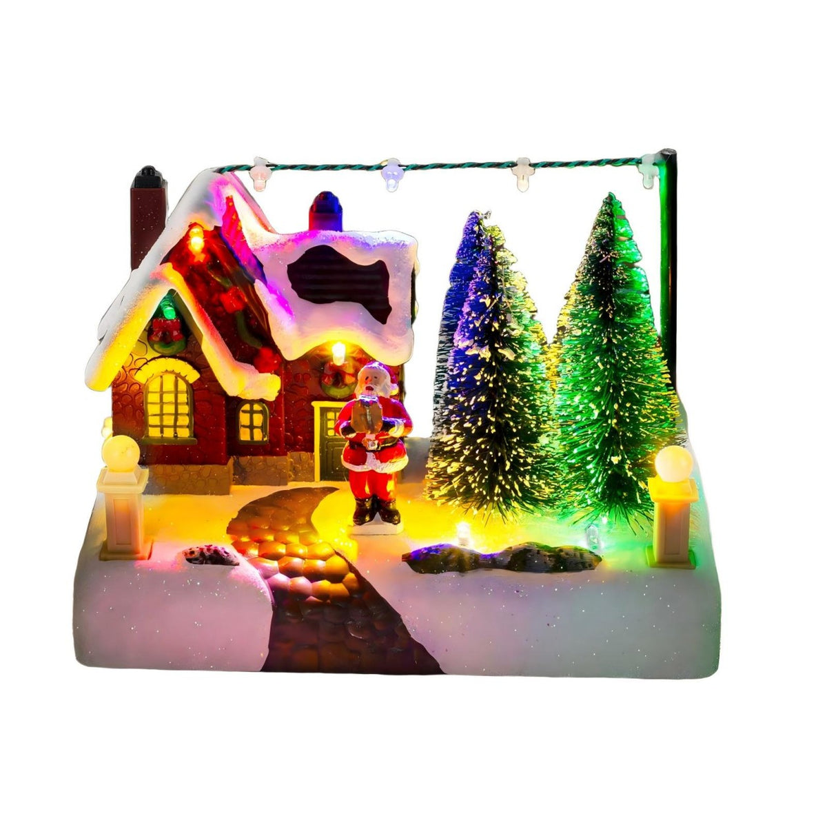 Lighted Christmas village house with Santa, snow-covered cottage and multicolor lights