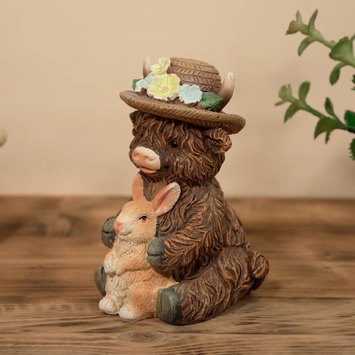 Cute Highland Cow Holding Bunny Figurine for Easter Spring Garden Decor - product image 2