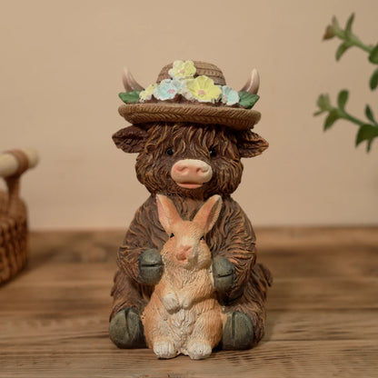 Cute Highland Cow Holding Bunny Figurine for Easter Spring Garden Decor