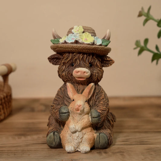 Cute Highland Cow Holding Bunny Figurine for Easter Spring Garden Decor