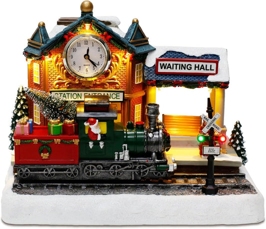 Christmas Village train station with moving train and clock on a light background