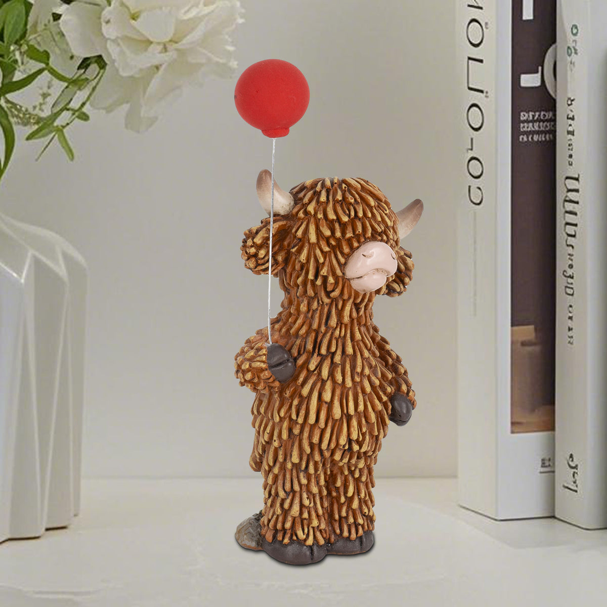 Cute Highland Cow Figurine with Red Balloon – Resin Desk Decor Statue - product image 2