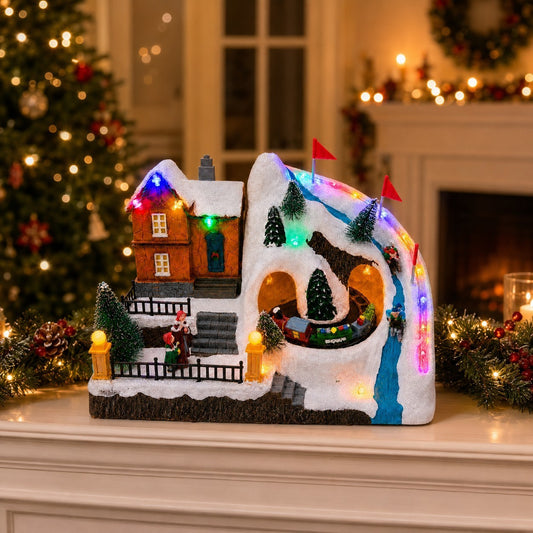 Musical Christmas village ski resort with a moving train and colorful lights displayed on a festive mantel
