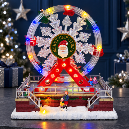 Lighted Santa snowflake Ferris wheel displayed on a console against a navy blue Christmas backdrop