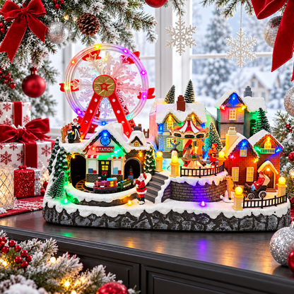 Lighted Christmas village displayed beside a snowy window with red bows, silver ornaments and festive gifts