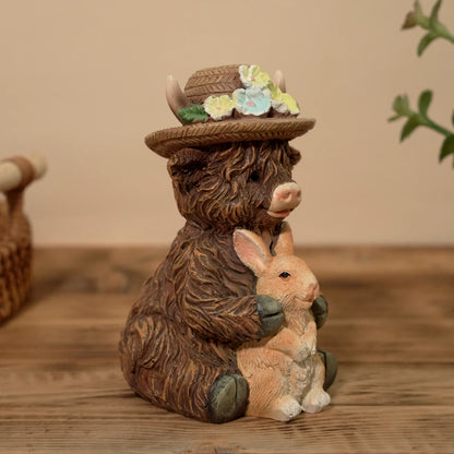 Cute Highland Cow Holding Bunny Figurine for Easter Spring Garden Decor - product image 3